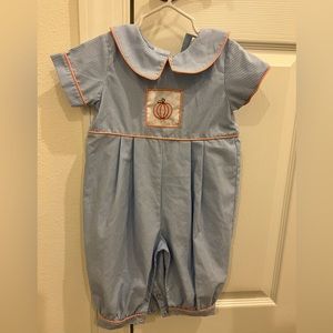 Worn once. Pumpkin romper